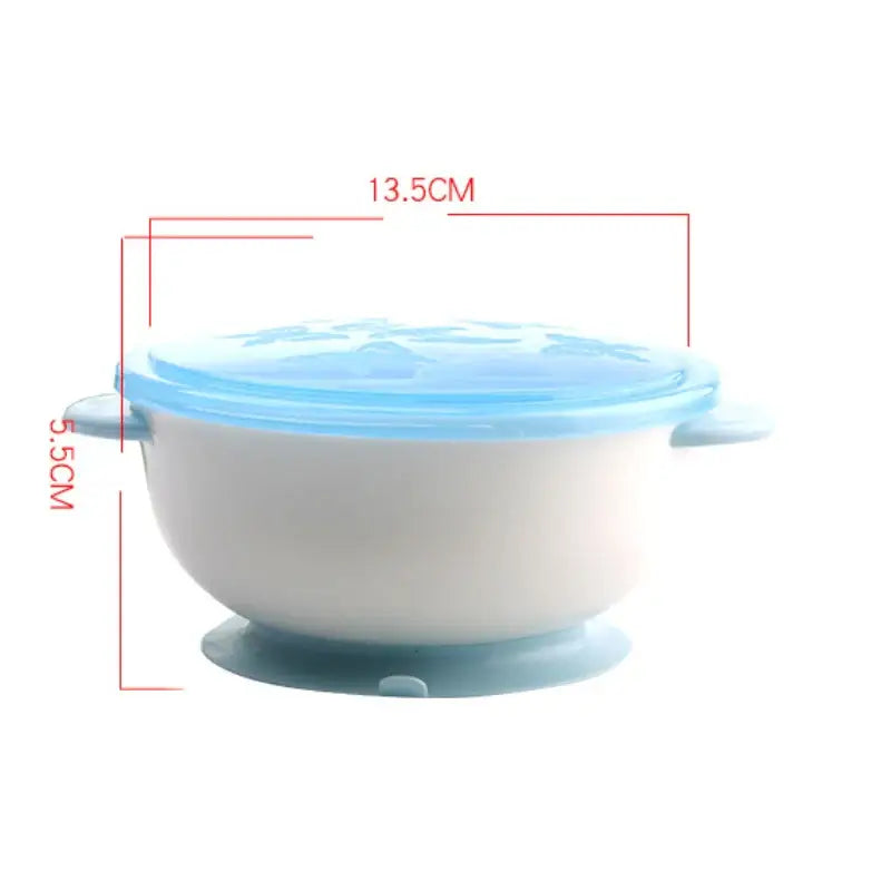 Suction bowl for babies with blue lid and strong suction base, designed for mess-free weaning and self-feeding.